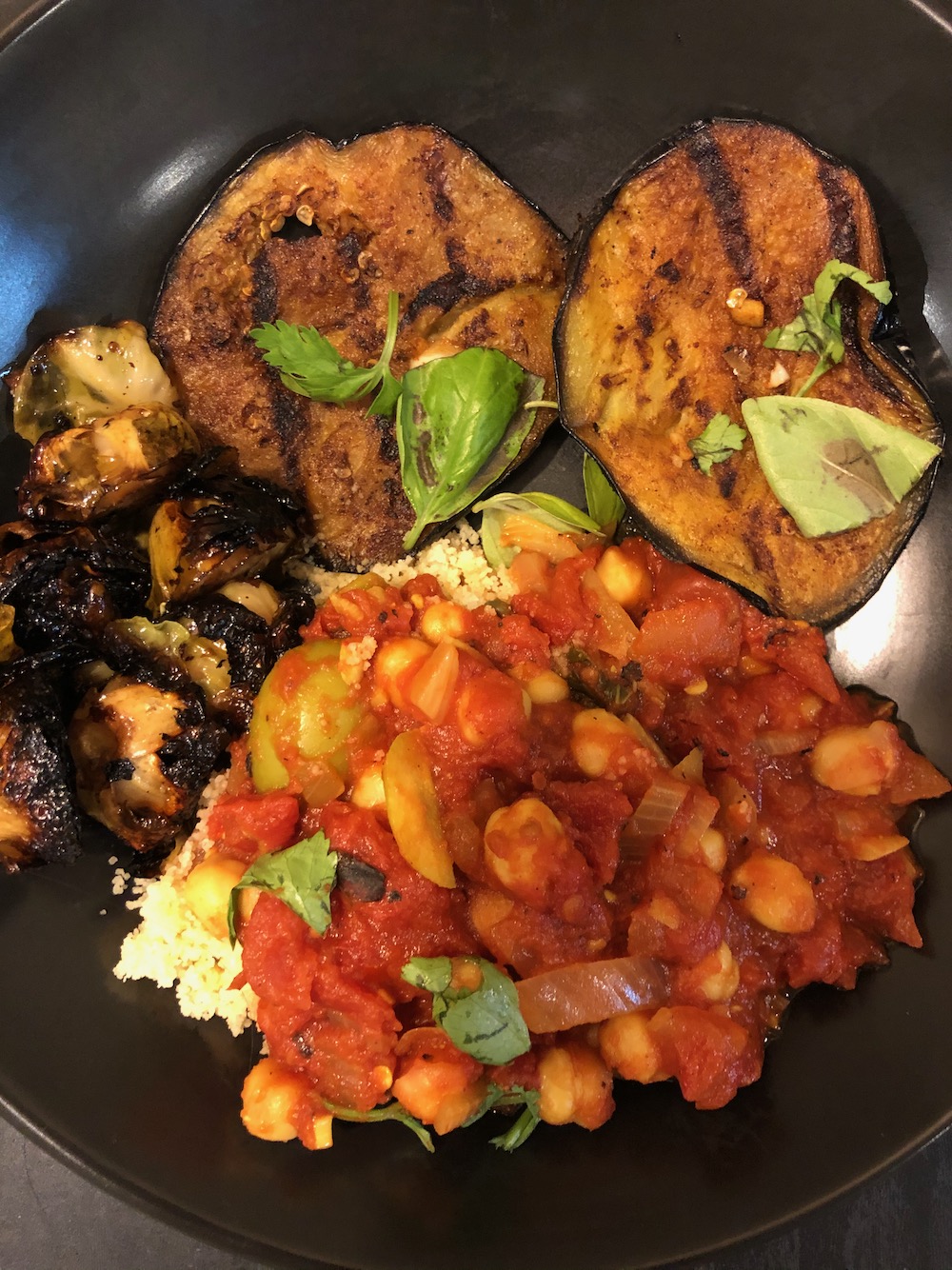The grilled eggplant with chickpeas simmered in tomato sauce.