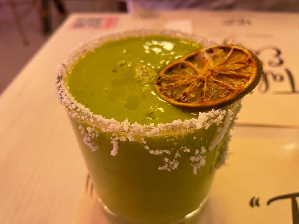 A super green juice from Pura Vida with the cocount shavings; its main ingredient is Lulo, which is hard to find in the states.